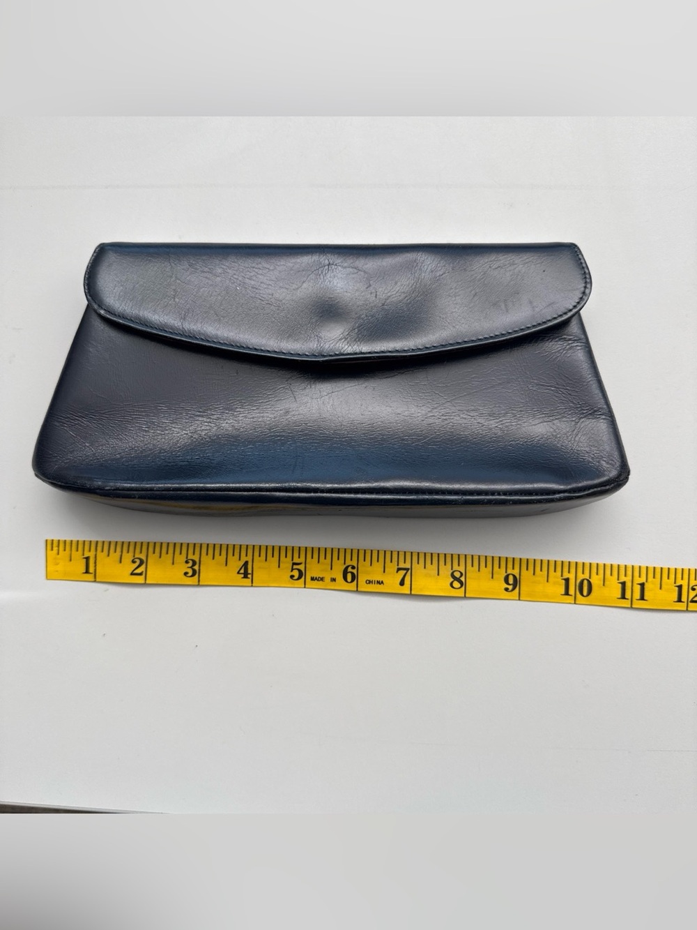 vintage Clutchette organizing clutch bag in a deep navy blue or black